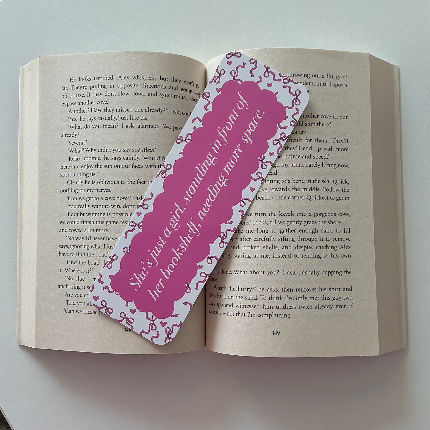 Just a girl standing in front of bookshelf bookmark
