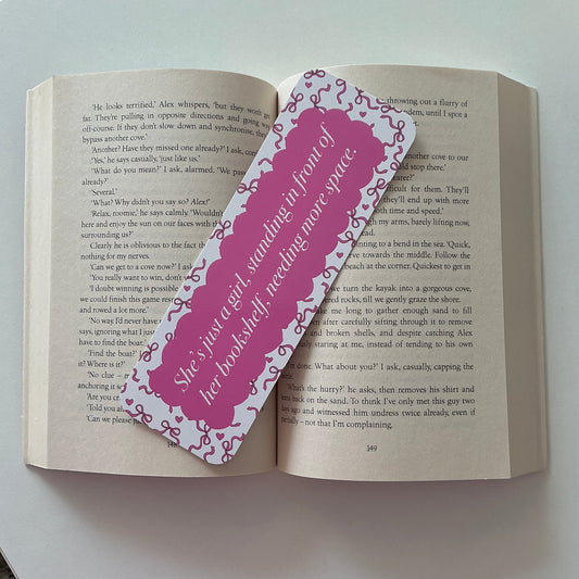 Just a girl standing in front of bookshelf bookmark